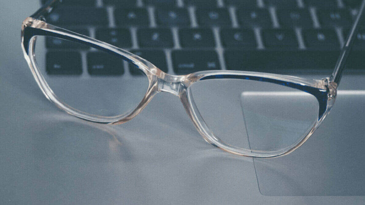 image showing reading glasses on laptop