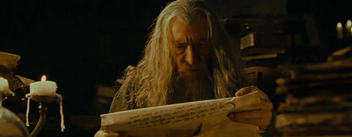 gandalf reading a scroll